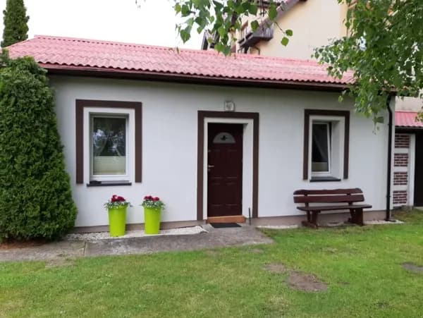 Pokoje Gościnne "Pod Modrzewiem" - Dąbki, Poland